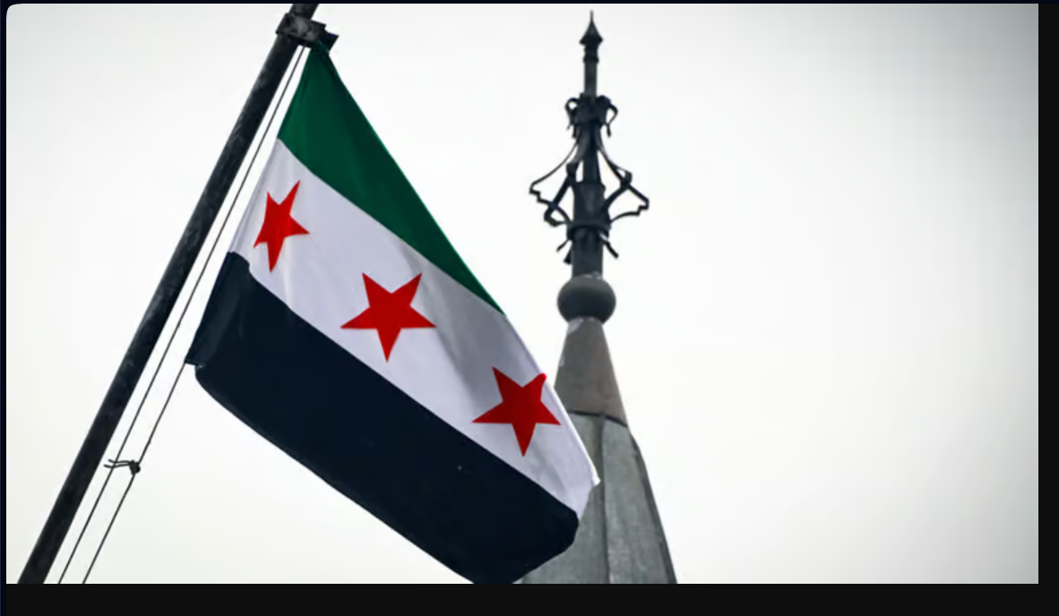 دہلی،شامی سفارتخانے پر باغیوں کا پرچم لہرا دیا گیا